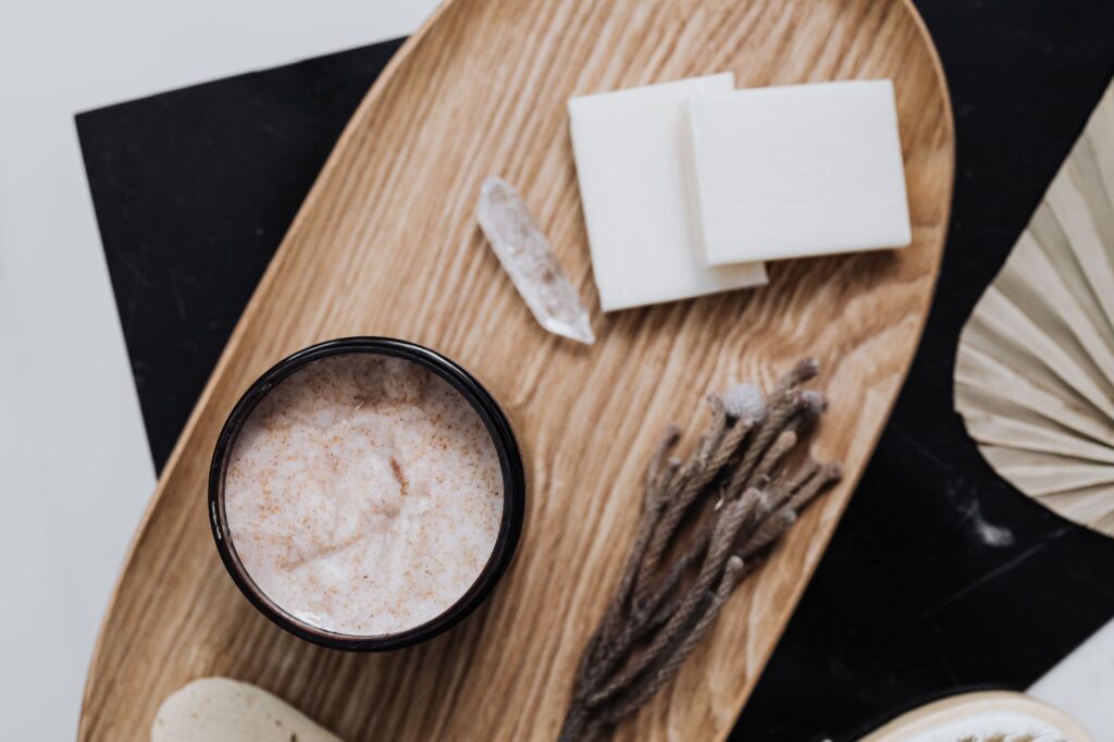 Premium spa treatment products displayed with natural materials